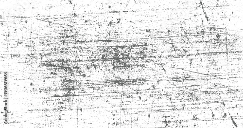 White surface with dense grey scratches and speckles creating a distressed texture effect background
