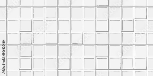 Close up of a white textured wall with a grid like repeating pattern