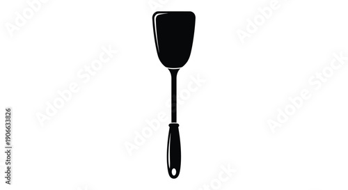 A black spatula isolated on a white background