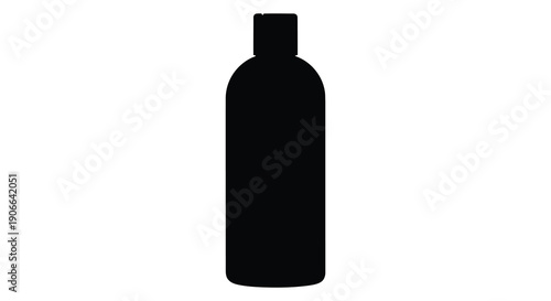 A stark black silhouette of a cylindrical bottle stands isolated on a plain white background offering a minimalist aesthetic silhouette