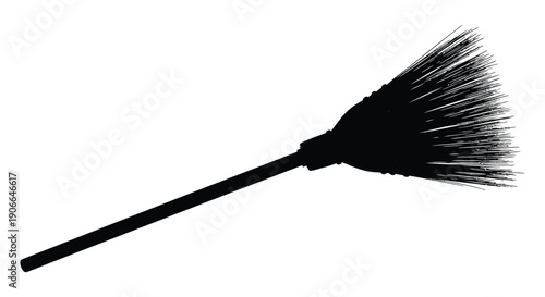 A stark black silhouette of a traditional witch s broom rests diagonally against a plain white background silhouette high quality professional detailed