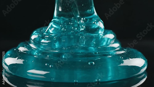 Wallpaper Mural Blue viscous gel with bubbles on reflective black surface Torontodigital.ca