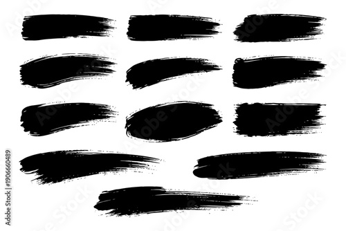 Set of black grunge brush strokes on white background.