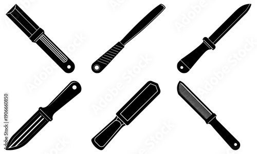 Various knives arranged in a circular pattern on a plain surface, viewed from directly above