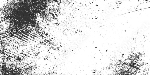 Black and white textured grunge background with distressed marks and speckles