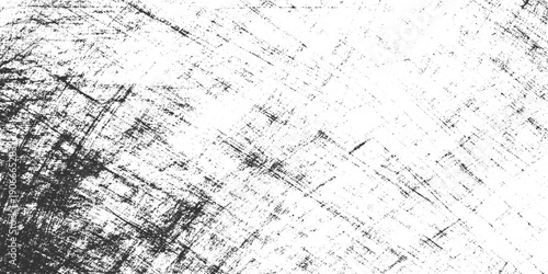 Black and white textured background with diagonal scratch marks and speckles grunge