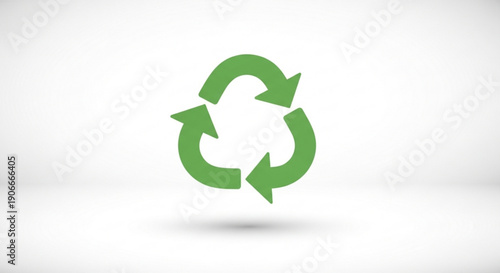 Green recycling symbol on white background with shadow