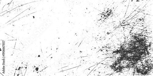 White surface with dense black scratches and speckles creating a distressed texture