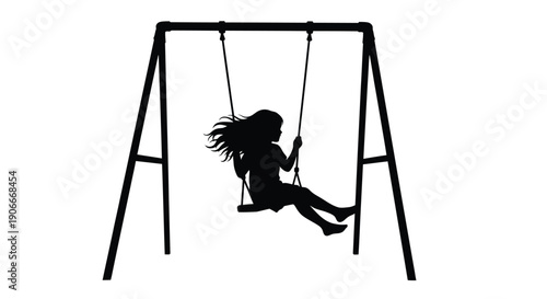 A child swings joyfully on a swing set a dark silhouette