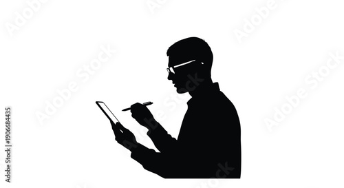 Silhouette of a man writing on a tablet with a stylus pen