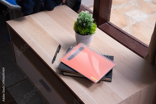 pile of books on the table