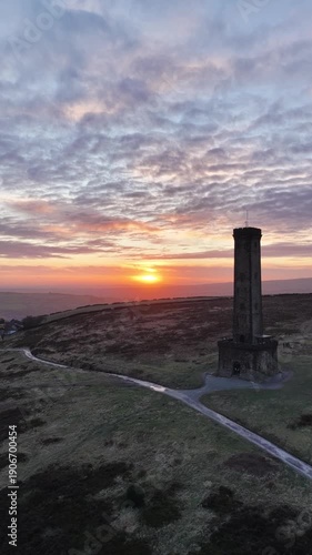 Aerial Vertical Video Sunset Over Peel Tower Holcombe Hill Ramsbottom Bury Lancashire United Kingdom 4K