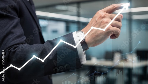 Business Growth Concept with Hand Pointing at Rising Graph Trends
