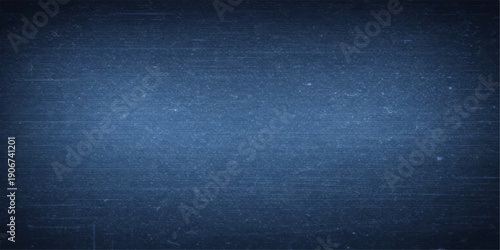 A dark blue grunge background features an old textured wall pattern with vintage aged paper and rough canvas material to create a dirty black backdrop for art design