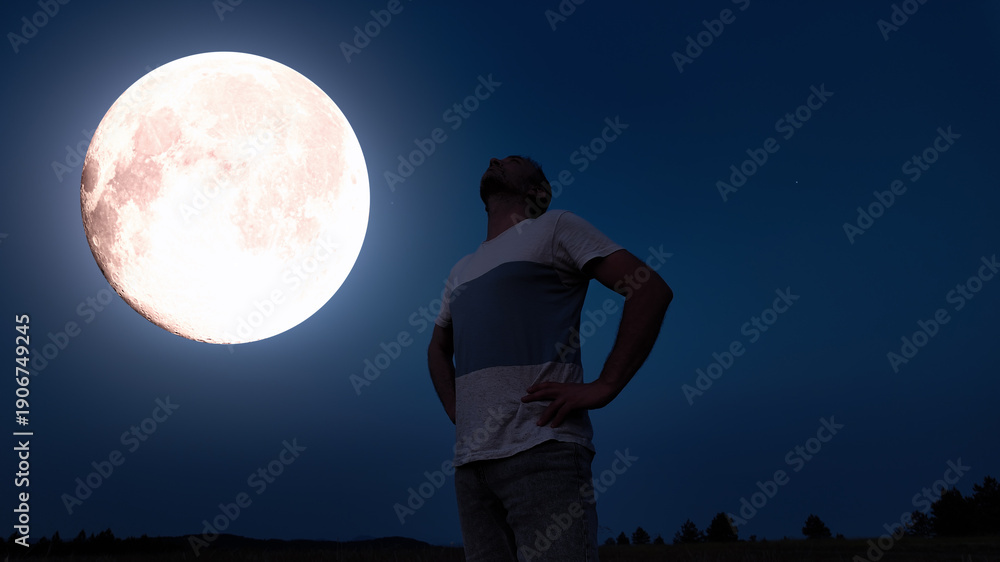 Fototapeta premium Amateur astronomer observing stars, planets, Moon eclipse and other celestial objects.