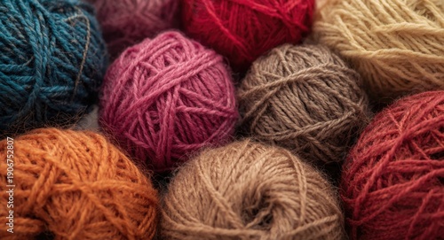Focused close up showing different knitting yarn types with rich texture details and colorful shades for crafts