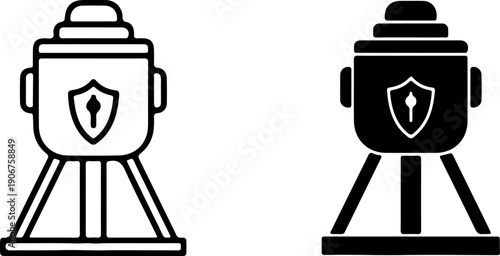 Black and white camera with shield on tripod