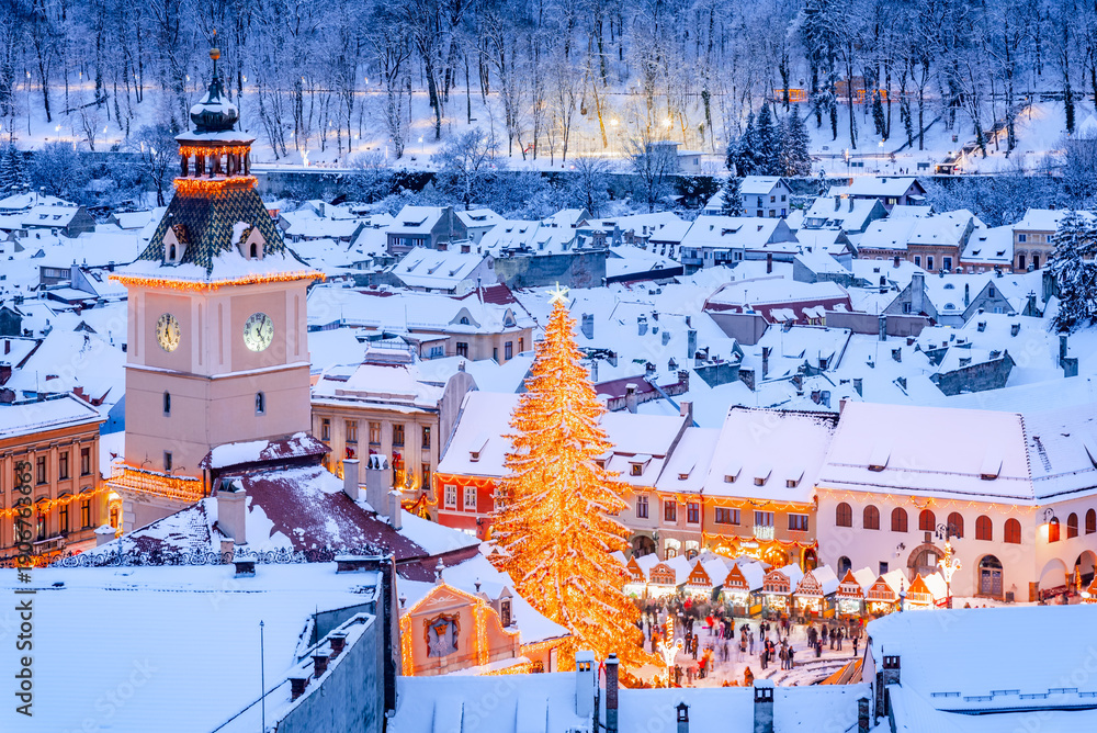 Fototapeta premium Brasov, Romania. Snowy evening view of the Christmas Market