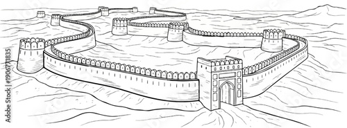 Ancient fortress wall with watchtowers and arched gateway in a barren landscape