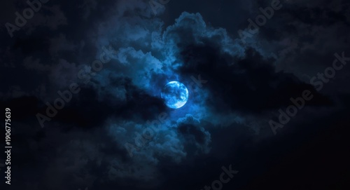 Wallpaper Mural Dark storm clouds clash around a glowing blue moon in a dramatic midnight sky Torontodigital.ca