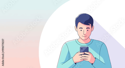 A young man in a light blue shirt smiles while looking at his smartphone