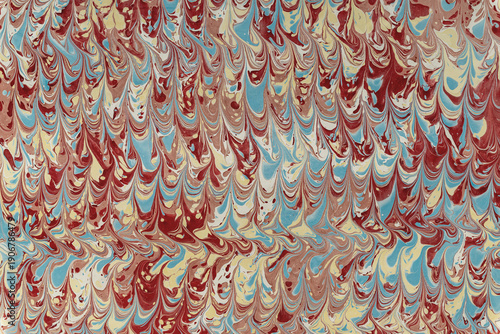 Abstract marbled paper pattern with colorful fluid texture creating background