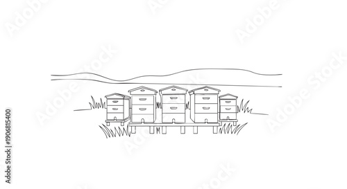 Black and white illustration of beehives standing in a field with mountains in the background, suitable for coloring pages or designs.