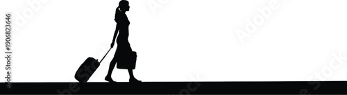 Woman walking with luggage and bag on ground floor viewed from the side