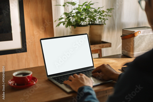 Wallpaper Mural computer screen blank mockup.work using laptop with white background for advertising,contact business search information on desk at coffee shop.marketing and creative design Torontodigital.ca