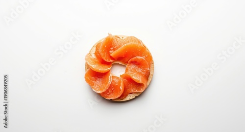 Halved bagel garnished with...