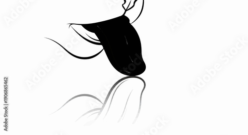 Black tongue extending, with a reflected shadow below