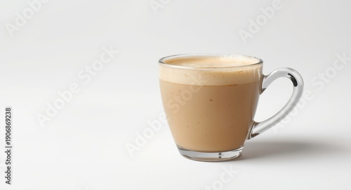 Glass cup of foamy coffee m...