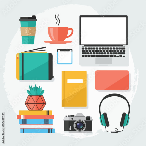 Flat lay of workspace elements computer, coffee, camera, headphones, books, and more