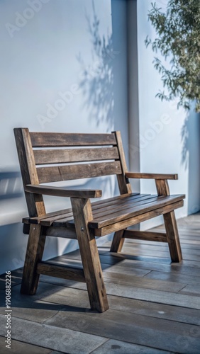 A rustic wooden bench stands alone against a crisp white backdrop, waiting to be filled with natures vibrant hues