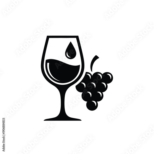Wine glass with a single drop and a bunch of grapes, representing the origin and essence of wine