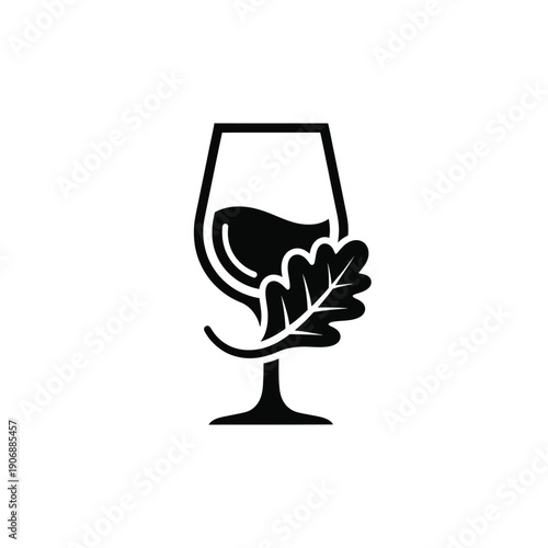 A vector illustration of a wine glass with an oak leaf design, creative simple concept for logo or icon