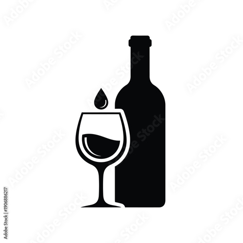 Single drop of wine falling into full glass next to bottle, concept of pouring or spilling