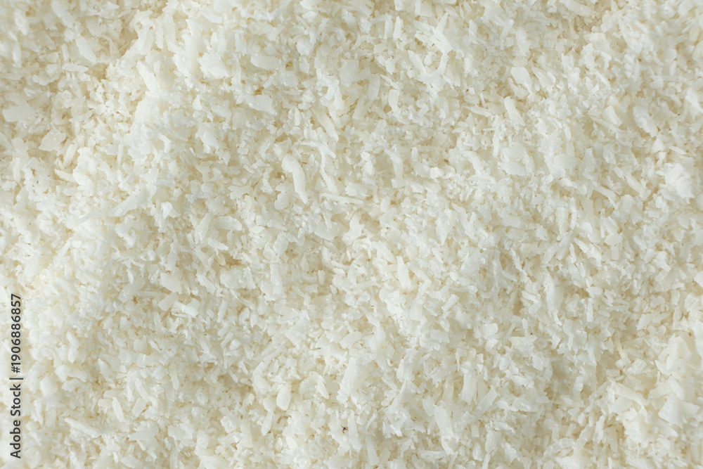 Fototapeta premium Macro Texture White Dried Coconut Flakes Top View