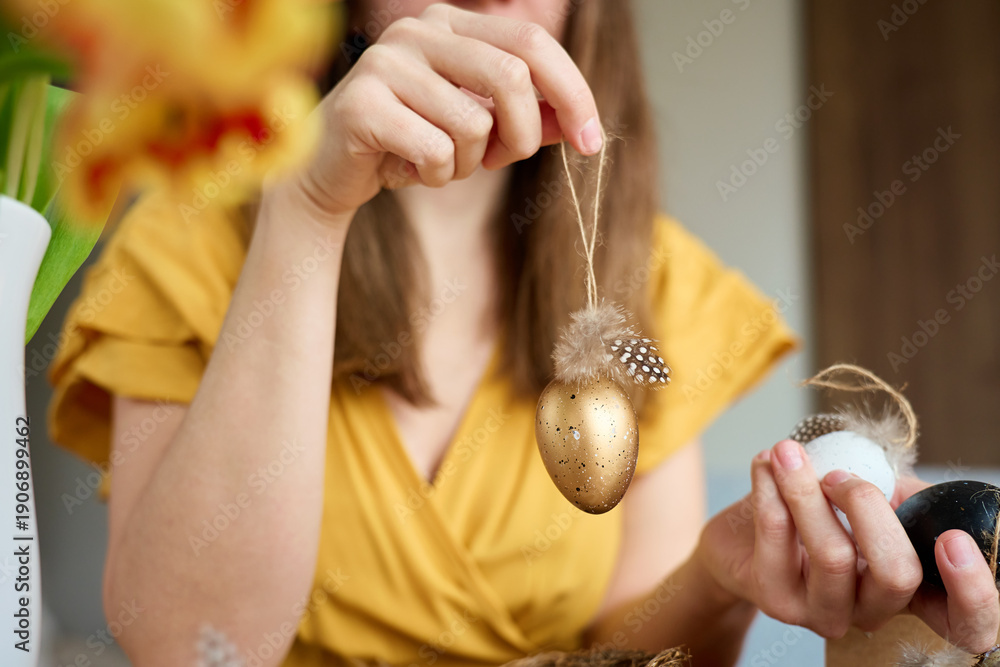 custom made wallpaper toronto digitalFemale hands holding decorative Easter eggs with feathers and natural twine. Concept of Easter holiday decor, spring celebration and handmade ornament.