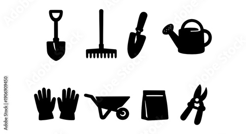 Silhouette of gardening tools including shovel, rake, trowel, watering can