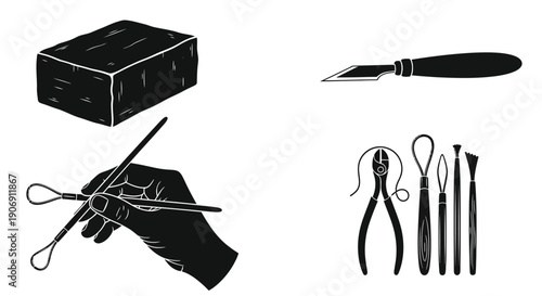 A collection of dental instruments and a block of wax for dental work.