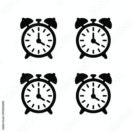 Four black alarm clocks on white background time wake up