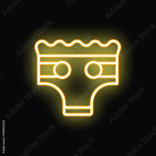 Yellow neon icon of a diaper glowing on a black background