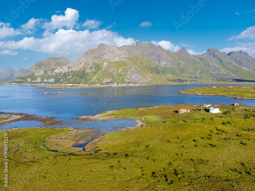 Aerial view near Fredvang overlooking salt marshes and coastal marshland with branching tidal creeks. Lofoten in Norway