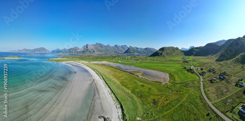 Aerial view of the North Atlantic coastal landscape with a view of Yttersand Beach near Fredvang, Lofoten Islands in Norway