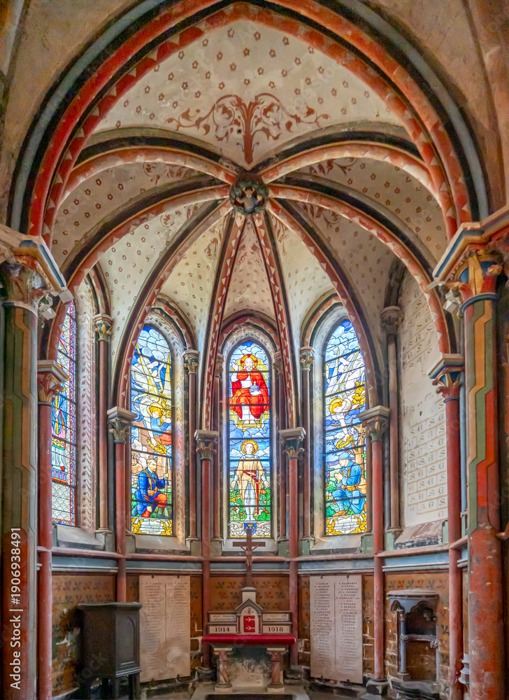 Fototapeta premium Semur-En-Auxois, France - 10 21 2025: Collegiate Church of Notre-Dame. Detail view of the Saint-Eloi chapel the commemorative chapel for the victims of the First World War with stained glass windows c
