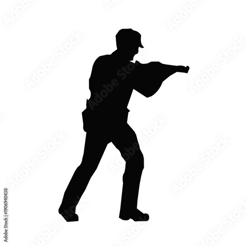 Silhouette of Man Shooting Handgun