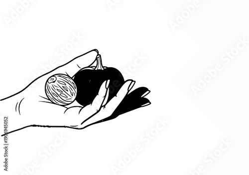 Open hand holding a small pumpkin and a striped seed