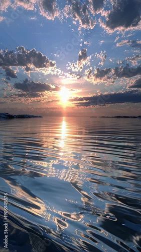 Sunrise reflecting on calm ocean water