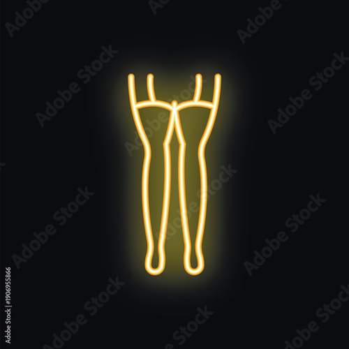 Golden neon sign representing woman legs with garter belt on black background